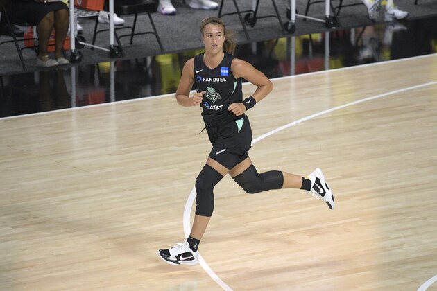 New York Liberty guard Sabrina Ionescu runs up the court after making a basket during the first half of a WNBA basketball game against the Seattle Storm, Saturday, July 25, 2020, in Bradenton, Fla. (AP Photo/Phelan M. Ebenhack)