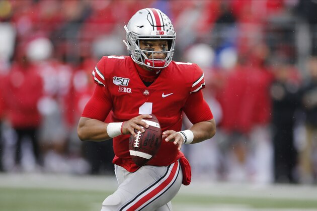 Ohio State quarterback Justin Fields plays against Wisconsin during an NCAA college football game Saturday, Oct. 26, 2019, in Columbus, Ohio. (AP Photo/Jay LaPrete)