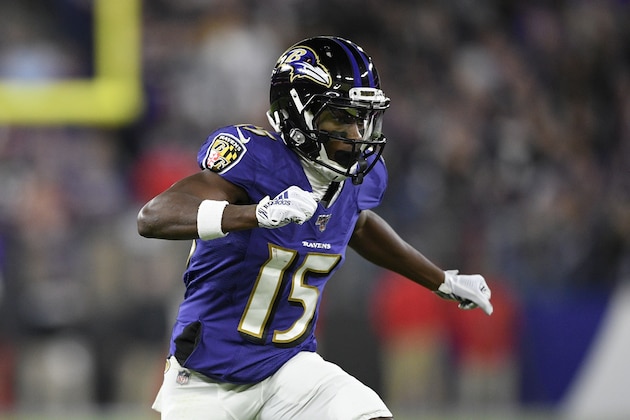 Baltimore Ravens wide receiver Marquise Brown (15) runs on the field during the first half an NFL divisional playoff football game against the Tennessee Titans, Saturday, Jan. 11, 2020, in Baltimore. (AP Photo/Nick Wass)