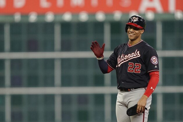 Washington Nationals' Juan Soto reacts after hitting a two-run scoring double during the fifth inning of Game 1 of the baseball World Series against the Houston Astros Tuesday, Oct. 22, 2019, in Houston. (AP Photo/David J. Phillip)