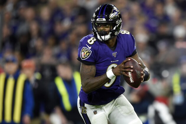 FILE - In this Jan. 11, 2020, file photo, Baltimore Ravens quarterback Lamar Jackson (8) rolls out of the pocket during the first half an NFL divisional playoff football game, against the Tennessee Titans in Baltimore. The reigning NFL MVP is eager to get started at training camp practice following an offseason in which he had a perilous encounter with a jet ski, tossed footballs to Antonio Brown and diligently avoided the coronavirus. (AP Photo/Gail Burton, File) FILE - In this Jan. 11, 2020, file photo, Baltimore Ravens quarterback Lamar Jackson (8) rolls out of the pocket during the first half an NFL divisional playoff football game, against the Tennessee Titans in Baltimore. The reigning NFL MVP is eager to get started at training camp practice following an offseason in which he had a perilous encounter with a jet ski, tossed footballs to Antonio Brown and diligently avoided the coronavirus. (AP Photo/Gail Burton, File)