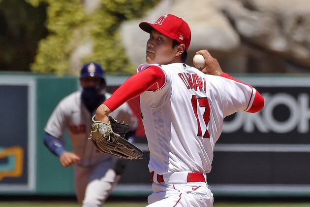 Los Angeles Angels pitcher Shohei Ohtani, right, of Japan, throws to the plate as Houston Astros' Yuli Gurriel stands at second during the second inning of a baseball game Sunday, Aug. 2, 2020, in Anaheim, Calif. (AP Photo/Mark J. Terrill) Los Angeles Angels pitcher Shohei Ohtani, right, of Japan, throws to the plate as Houston Astros' Yuli Gurriel stands at second during the second inning of a baseball game Sunday, Aug. 2, 2020, in Anaheim, Calif. (AP Photo/Mark J. Terrill)