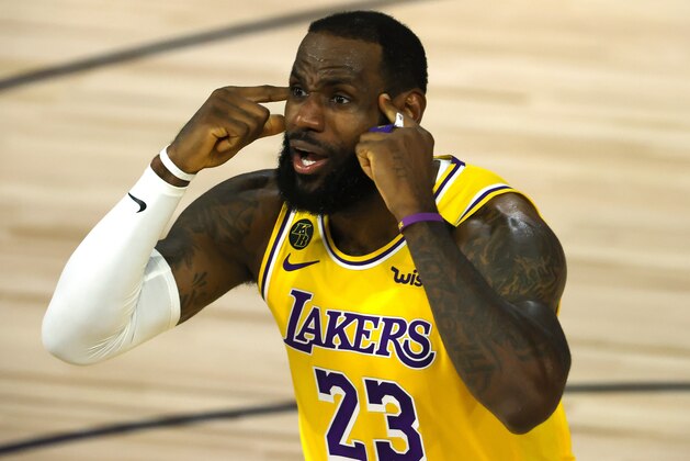LeBron James of the Los Angeles Lakers reacts against the Oklahoma City Thunder during the second quarter during an NBA basketball game Wednesday, Aug. 5, 2020, in Lake Buena Vista, Fla. (Kevin C. Cox/Pool Photo via AP)