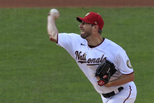 Washington Nationals starting pitcher Max Scherzer (31) throws during the first inning of a baseball game against the New York Mets in Washington, Wednesday, Aug. 5, 2020. (AP Photo/Manuel Balce Ceneta)