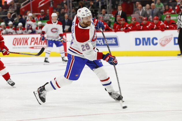 Montreal Canadiens defenseman Jeff Petry (26) shoots against the Detroit Red Wings in the third period of an NHL hockey game Tuesday, Feb. 18, 2020, in Detroit. (AP Photo/Paul Sancya)