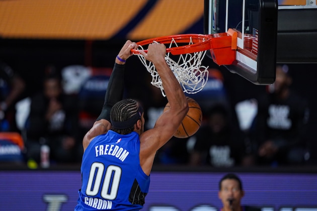 Orlando Magic forward Aaron Gordon (00) gets a dunk against the Indiana Pacers during the second half of an NBA basketball game Tuesday, Aug. 4, 2020 in Lake Buena Vista, Fla. (AP Photo/Ashley Landis)