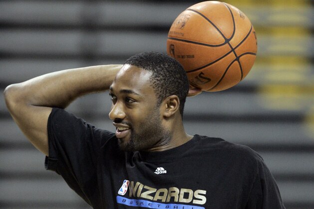 Washington Wizards' Gilbert Arenas shoots a few baskets after basketball practice at the Siegal Center on the campus of Virginia Commonwealth University  in Richmond, Va., Wednesday, Oct. 1, 2008.  (AP Photo/Steve Helber)