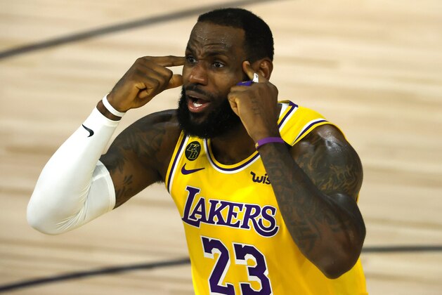 LeBron James of the Los Angeles Lakers reacts against the Oklahoma City Thunder during the second quarter during an NBA basketball game Wednesday, Aug. 5, 2020, in Lake Buena Vista, Fla. (Kevin C. Cox/Pool Photo via AP)