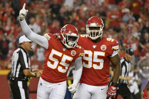 Kansas City Chiefs defensive end Frank Clark (55) celebrates with defensive end Chris Jones (95) after he sacked San Francisco 49ers quarterback Jimmy Garoppolo during the first half of an NFL preseason football game in Kansas City, Mo., Saturday, Aug. 24, 2019. (AP Photo/Ed Zurga)
