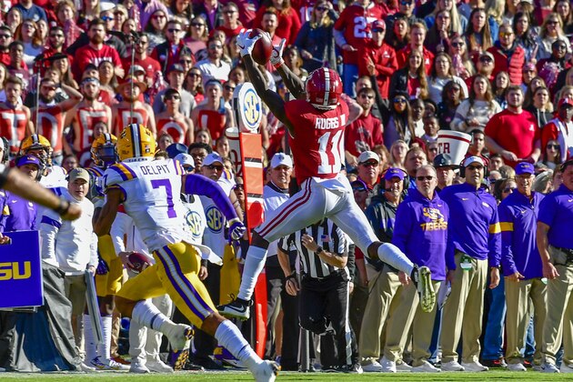 Alabama wide receiver Henry Ruggs III (11) grabs a pass in front of LSU defensive back Grant Delpit (7) in the first half of an NCAA football game Saturday, Nov. 9, 2019, in Tuscaloosa, Ala. (AP Photo/Vasha Hunt)