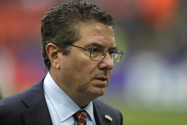 Washington Redskins owner Daniel Snyder leaves after the warm-up before an NFL Football game against Cincinnati Bengals at Wembley Stadium in London, Sunday Oct. 30, 2016. (AP Photo/Matt Dunham)