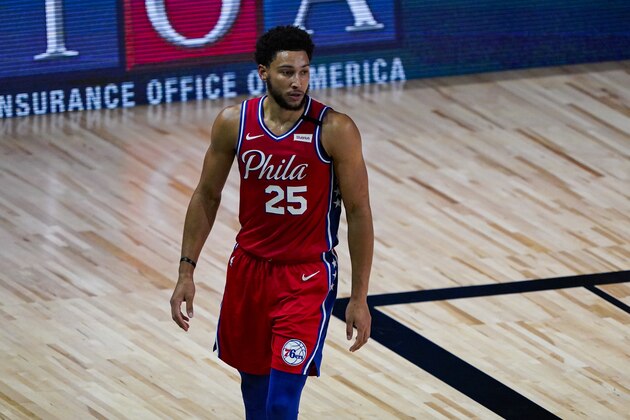 Philadelphia 76ers guard Ben Simmons (25) walks up the court during the first half of an NBA basketball game against the Washington Wizards Wednesday, Aug. 5, 2020 in Lake Buena Vista, Fla. (AP Photo/Ashley Landis) Philadelphia 76ers guard Ben Simmons (25) walks up the court during the first half of an NBA basketball game against the Washington Wizards Wednesday, Aug. 5, 2020 in Lake Buena Vista, Fla. (AP Photo/Ashley Landis)