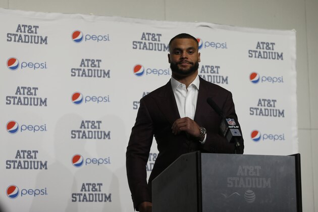 Dallas Cowboys quarterback Dak Prescott talks with the media following an NFL football game against the Washington Redskins in Arlington, Texas, Sunday, Dec. 15, 2019. (AP Photo/Ron Jenkins)