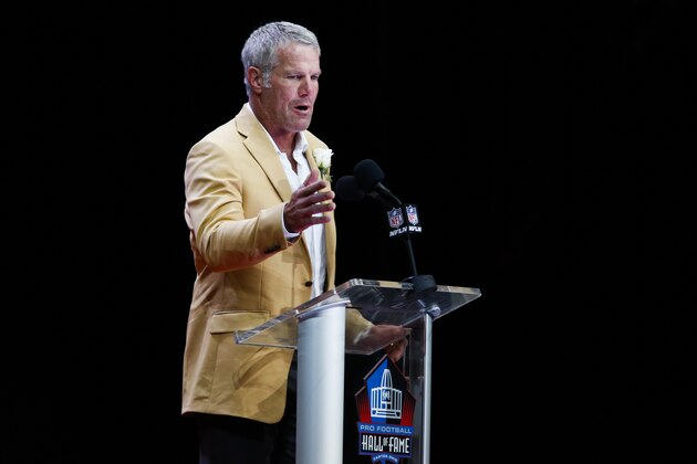 Former NFL player Brett Favre delivers his speech during an induction ceremony at the Pro Football Hall of Fame Saturday, Aug.6, 2016, in Canton, Ohio. (AP Photo/Ron Schwane)