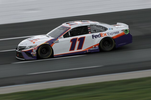 Driver Denny Hamlin (11) races during a NASCAR Cup Series auto race, Sunday, Aug. 2, 2020, at the New Hampshire Motor Speedway in Loudon, N.H. (AP Photo/Charles Krupa)
