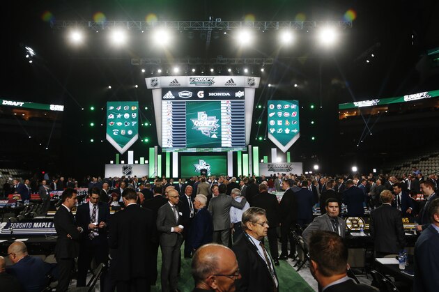 League and team officials attend the NHL hockey draft in Dallas, Friday, June 22, 2018. (AP Photo/Michael Ainsworth)