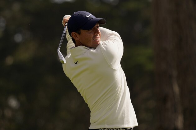 Rory McIlroy of Northern Ireland, watches his tee shot on the eighth hole during the second round of the PGA Championship golf tournament at TPC Harding Park Friday, Aug. 7, 2020, in San Francisco. (AP Photo/Jeff Chiu)