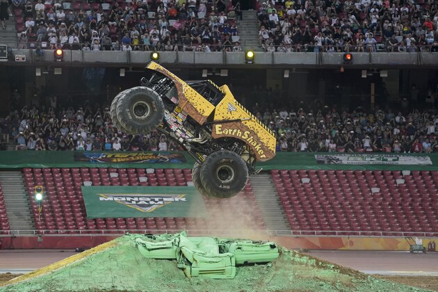 IMAGE DISTRIBUTED FOR FELD ENTERTAINMENT - Earth Shaker entertains the spectators with a big air during the first-ever monster truck event in Beijing's renowned
