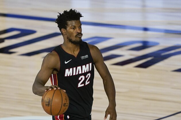 Miami Heat's Jimmy Butler (22) makes his way down the court during an NBA basketball game against the Toronto Raptors Monday, Aug. 3, 2020, in Lake Buena Vista, Fla. (AP Photo/Ashley Landis, Pool) Miami Heat's Jimmy Butler (22) makes his way down the court during an NBA basketball game against the Toronto Raptors Monday, Aug. 3, 2020, in Lake Buena Vista, Fla. (AP Photo/Ashley Landis, Pool)