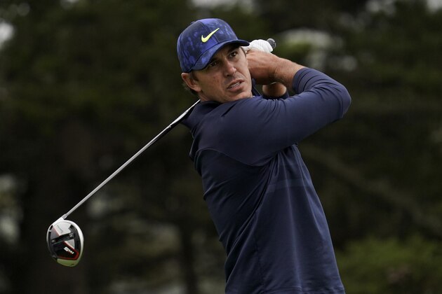 Brooks Koepka watches his tee shot on the 14th hole during the third round of the PGA Championship golf tournament at TPC Harding Park Saturday, Aug. 8, 2020, in San Francisco. (AP Photo/Jeff Chiu)