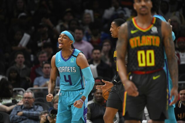 Charlotte Hornets guard Devonte' Graham (4) reacts during an NBA basketball game against the Atlanta Hawks, Monday, March 9, 2020, in Atlanta. (AP Photo/John Amis)