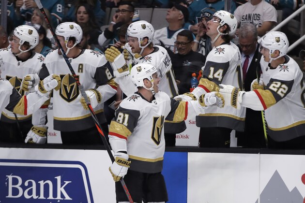 Vegas Golden Knights' Jonathan Marchessault (81) is congratulated after scoring a goal against the San Jose Sharks during the first period of an NHL hockey game Friday, Oct. 4, 2019, in San Jose, Calif. (AP Photo/Ben Margot)