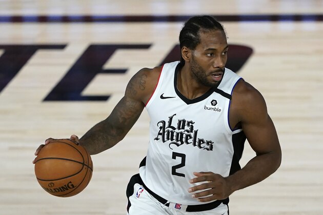Los Angeles Clippers' Kawhi Leonard (2) makes his way down the court during an NBA basketball game against the Dallas Mavericks Thursday, Aug. 6, 2020, in Lake Buena Vista, Fla. (AP Photo/Ashley Landis, Pool)