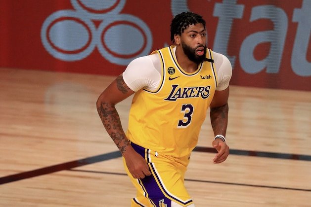 Los Angeles Lakers Anthony Davis (3) runs down court during the second quarter of an NBA basketball game against   the Los Angeles Clippers, Thursday, July 30, 2020, in Lake Buena Vista, Fla. (Mike Ehrmann/Pool via AP)