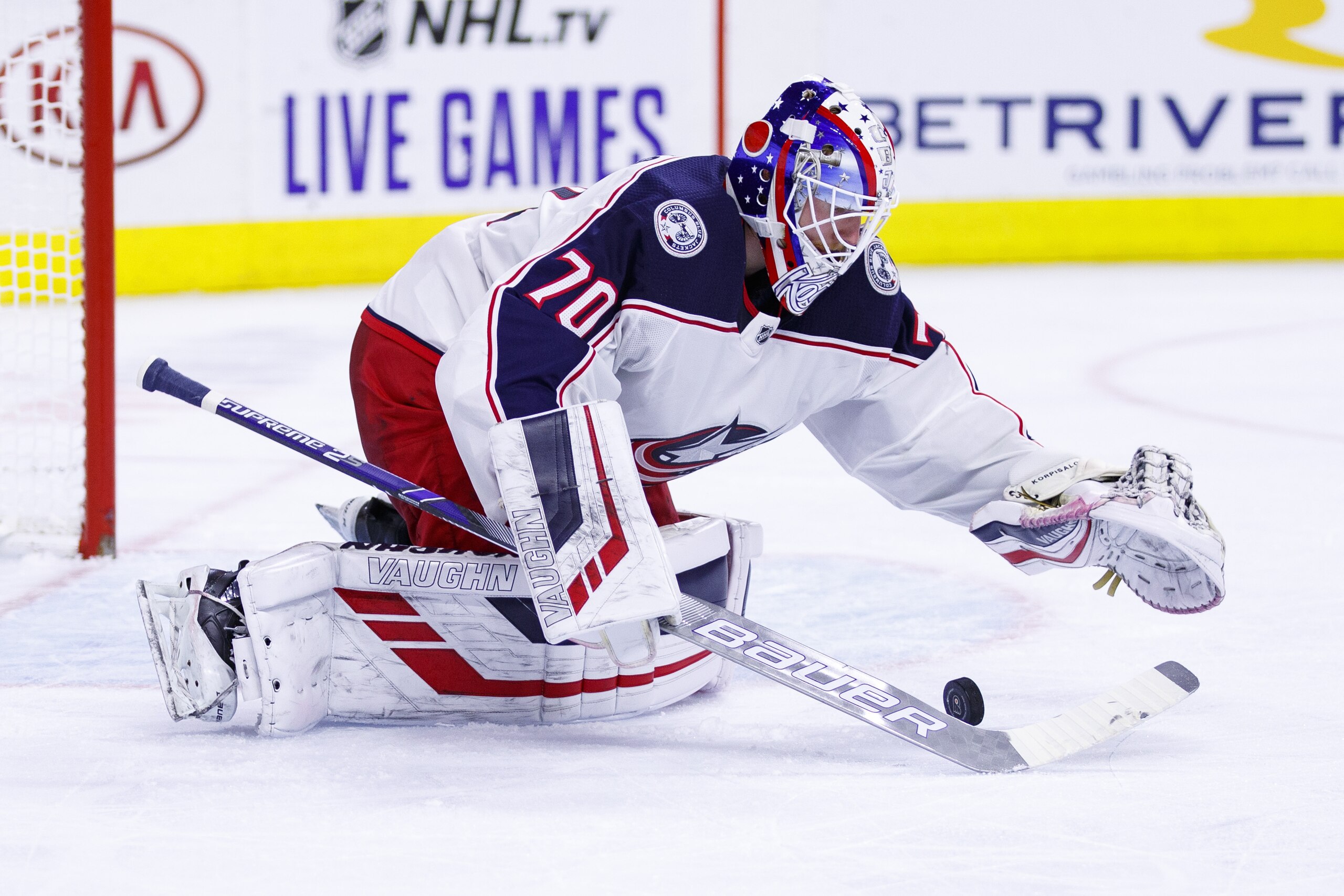 Columbus Blue Jackets' Joonas Korpisalo goes after the puck during the second period of an NHL hockey game against the Philadelphia Flyers, Saturday, Oct. 26, 2019, in Philadelphia. The Flyers won 7-4. (AP Photo/Chris Szagola)