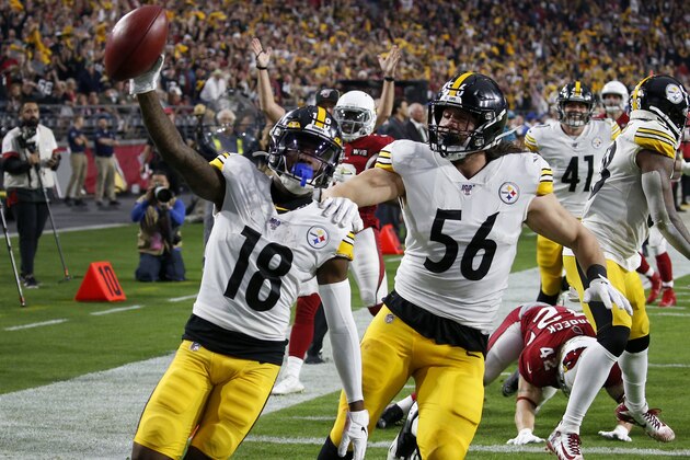 Pittsburgh Steelers wide receiver Diontae Johnson (18) runs in an 85-yard punt return for a touchdown against the Arizona Cardinals during the first half of an NFL football game, Sunday, Dec. 8, 2019, in Glendale, Ariz. (AP Photo/Ross D. Franklin)