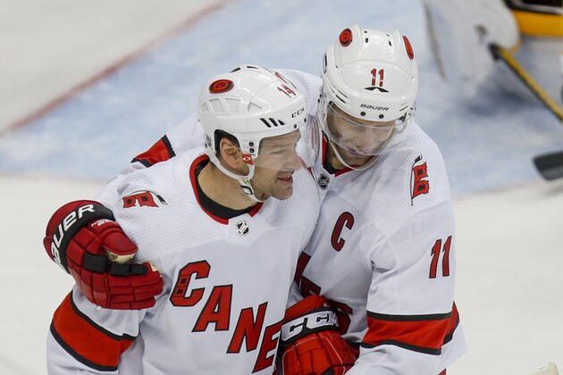 Carolina Hurricanes' Justin Williams (14) celebrates with Jordan Staal after scoring against the Pittsburgh Penguins during the third period of an NHL hockey game, Sunday, March 8, 2020, in Pittsburgh. The Hurricanes won 6-2. (AP Photo/Keith Srakocic) Carolina Hurricanes' Justin Williams (14) celebrates with Jordan Staal after scoring against the Pittsburgh Penguins during the third period of an NHL hockey game, Sunday, March 8, 2020, in Pittsburgh. The Hurricanes won 6-2. (AP Photo/Keith Srakocic)