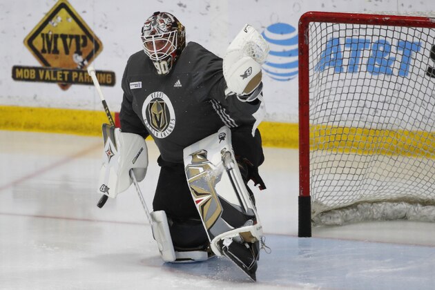 Vegas Golden Knights goaltender Robin Lehner (90) makes a save during NHL hockey training camp, Tuesday, July 14, 2020, in Las Vegas. (AP Photo/John Locher)