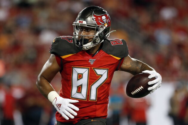 Tampa Bay Buccaneers tight end Jordan Leggett scores against the Cleveland Browns during the second half of an NFL preseason football game Friday, Aug. 23, 2019, in Tampa, Fla. (AP Photo/Mark LoMoglio)