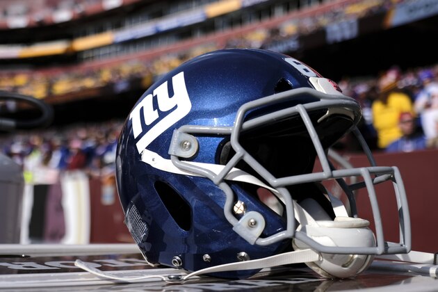 A New York Giants helmet is seen near the bench during the first half of an NFL football game against the Washington Redskins, Sunday, Dec. 22, 2019, in Landover, Md. (AP Photo/Mark Tenally)
