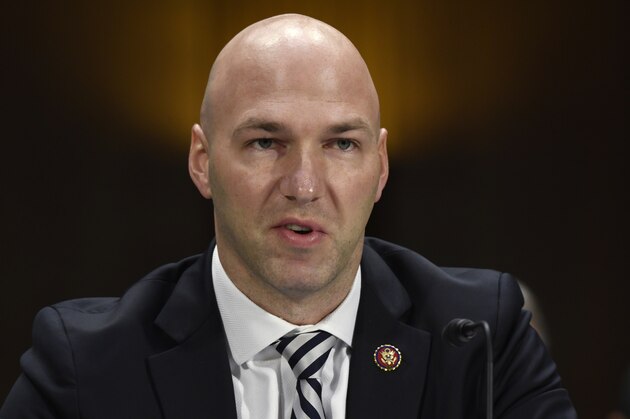 FILE - In this Tuesday, Feb. 11, 2020, file photo, Rep. Anthony Gonzalez, R-Ohio, speaks during a Senate Commerce subcommittee hearing on Capitol Hill in Washington, on intercollegiate athlete compensation. Federal legislation setting guidelines for college athletes to pursue money-making opportunities could be proposed within a month, and Gonzalez, who is planning to introduce it, said Thursday, June 4, 2020, there will be no blanket antitrust exemption for the NCAA. (AP Photo/Susan Walsh, File)