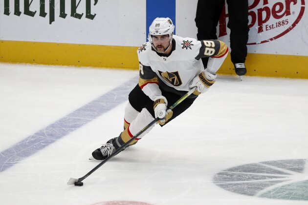 Vegas Golden Knights right wing Alex Tuch (89) controls the puck during an NHL hockey game against the Dallas Stars in Dallas, Monday, Nov. 25, 2019. (AP Photo/Tony Gutierrez)