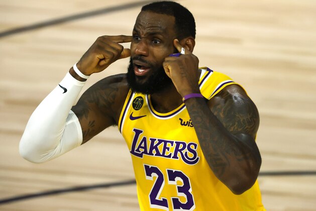 LeBron James of the Los Angeles Lakers reacts against the Oklahoma City Thunder during the second quarter during an NBA basketball game Wednesday, Aug. 5, 2020, in Lake Buena Vista, Fla. (Kevin C. Cox/Pool Photo via AP)