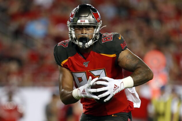 Tampa Bay Buccaneers tight end Jordan Leggett scores against the Cleveland Browns during the second half of an NFL preseason football game Friday, Aug. 23, 2019, in Tampa, Fla. (AP Photo/Mark LoMoglio) Tampa Bay Buccaneers tight end Jordan Leggett scores against the Cleveland Browns during the second half of an NFL preseason football game Friday, Aug. 23, 2019, in Tampa, Fla. (AP Photo/Mark LoMoglio)