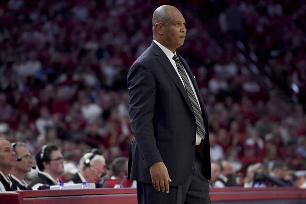 Kentucky associate head coach Kenny Payne watches from the sideline after head coach John Calipari was ejected from an NCAA collage basketball game against Arkansas during the second half Saturday, Jan. 18, 2020, in Fayetteville, Ark. (AP Photo/Michael Woods)