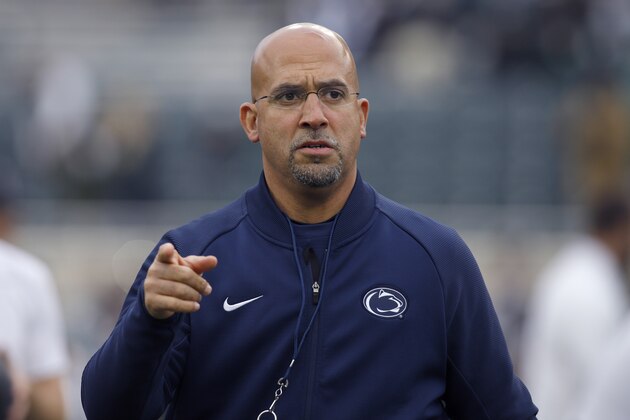 FILE - This file photo from Oct. 26, 2019 shows Penn State coach James Franklin as he watches the team warm before an NCAA college football game against Michigan State, in East Lansing, Mich. A football player who transferred from Penn State claims in a lawsuit filed Monday, Jan. 13, 2020, against the university, and head coach James Franklin, that other Nittany Lions players hazed him and other younger teammates, including allegations they imitated sexual acts in the shower and invoked Jerry Sandusky's name. (AP Photo/Al Goldis, File)
