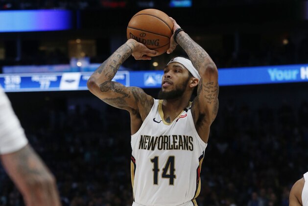 New Orleans Pelicans forward Brandon Ingram shoots a 3-pointer against the Dallas Mavericks during the second half of an NBA basketball game in Dallas, Wednesday, March 4, 2020. (AP Photo/Michael Ainsworth)