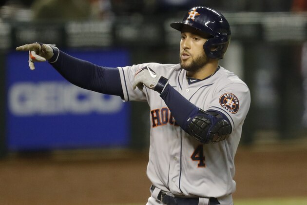 Houston Astros' George Springer (4) crosses the plate after hitting a two run home run against the Arizona Diamondbacks during the fifth inning of a baseball game Wednesday, Aug. 5, 2020, in Phoenix. (AP Photo/Matt York)