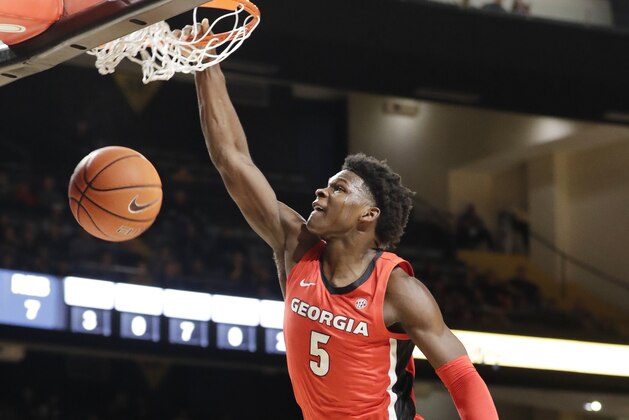 Georgia guard Anthony Edwards (5) dunks the ball against Vanderbilt in the first half of an NCAA college basketball game Saturday, Feb. 22, 2020, in Nashville, Tenn. (AP Photo/Mark Humphrey)