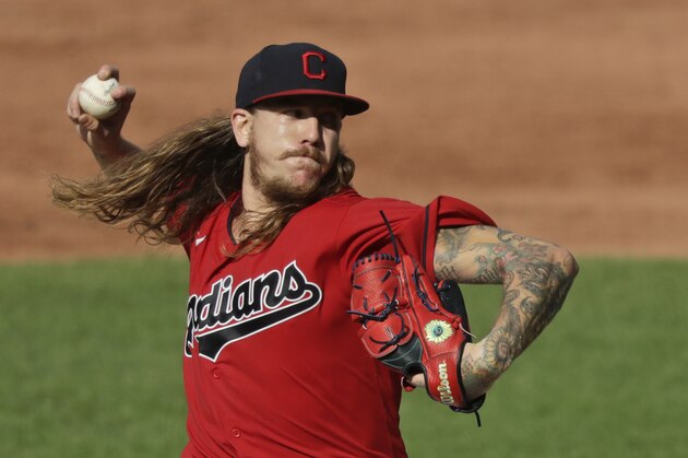 Cleveland Indians starting pitcher Mike Clevinger delivers in the third inning in a baseball game against the Kansas City Royals, Saturday, July 25, 2020, in Cleveland. (AP Photo/Tony Dejak)