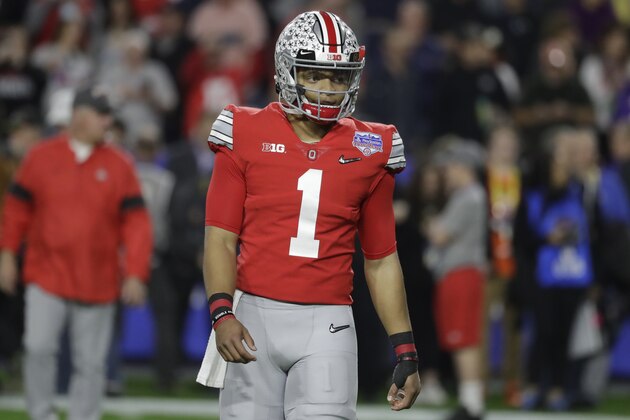 Ohio State quarterback Justin Fields (1) during the first half of the Fiesta Bowl NCAA college football game against Clemson, Saturday, Dec. 28, 2019, in Glendale, Ariz. (AP Photo/Rick Scuteri).