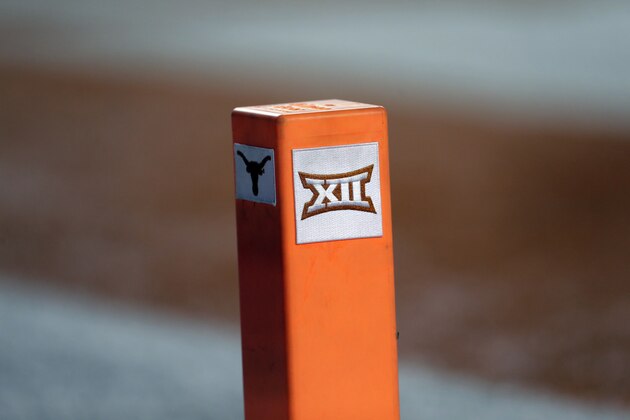 The Big 12 logo is seen on a pylon during the first half of an NCAA college football game between Texas and USC, Saturday, Sept. 15, 2018, in Austin, Texas. (AP Photo/Eric Gay)
