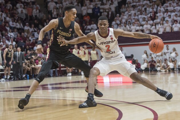Virginia Tech guard Landers Volley (2) keeps ball away from Florida State defender Devin Vassell (24) during the second half of an NCAA college basketball game in Blacksburg, Va., Saturday, Feb. 1, 2020. (AP Photo/Lee Luther Jr.) Virginia Tech guard Landers Volley (2) keeps ball away from Florida State defender Devin Vassell (24) during the second half of an NCAA college basketball game in Blacksburg, Va., Saturday, Feb. 1, 2020. (AP Photo/Lee Luther Jr.)