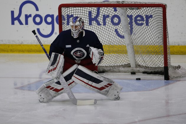Columbus Blue Jackets' Joonas Korpisalo, of Finland, takes shots during the NHL hockey team's practice Monday, July 20, 2020, in Columbus, Ohio. (AP Photo/Jay LaPrete)