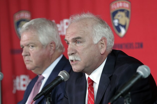 Florida Panthers General Manager Dale Tallon, left, sits with Joel Quenneville, who was introduced as the Panthers new head coach during a news conference, Monday, April 8, 2019, in Sunrise, Fla. (AP Photo/Lynne Sladky)