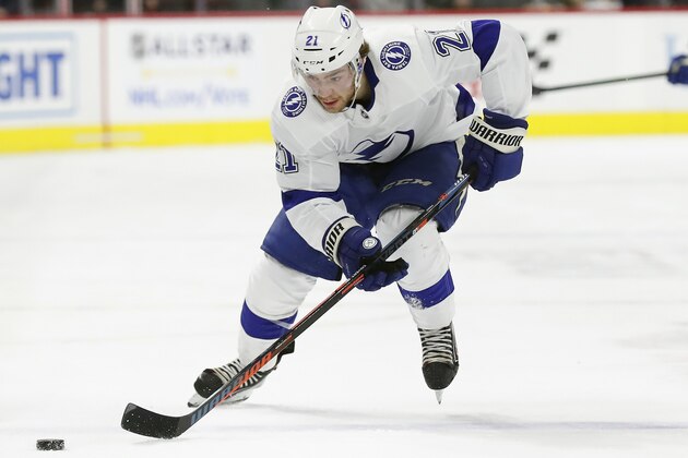 Tampa Bay Lightning center Brayden Point (21) skates against the Carolina Hurricanes during the first period of an NHL hockey game in Raleigh, N.C., Sunday, Jan. 5, 2020. (AP Photo/Gerry Broome)